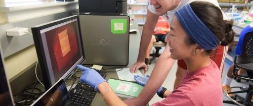 Students viewing lab test results