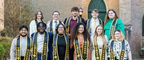 2023 Bonner graduating cohort group photo with eleven students